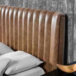 CAMA TAPIZADA EN PIEL