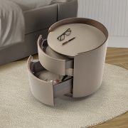 Mesita de noche redonda tapizada con dos cajones