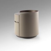 Mesita de noche redonda tapizada con dos cajones