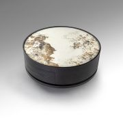 Mesa de centro redonda con tapa de porcelánico