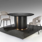 Mesa de comedor redonda con tapa en marmol